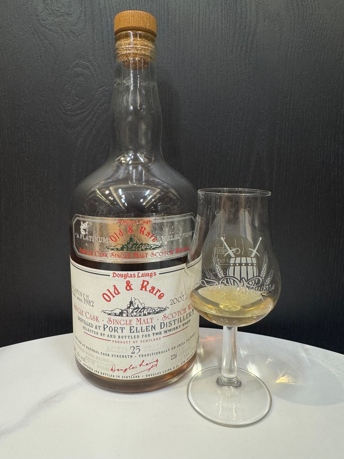 Douglas Laing Old & Rare Port Ellen 1982/2007 for The Whisky Shop, supplied foreground bottle photograph