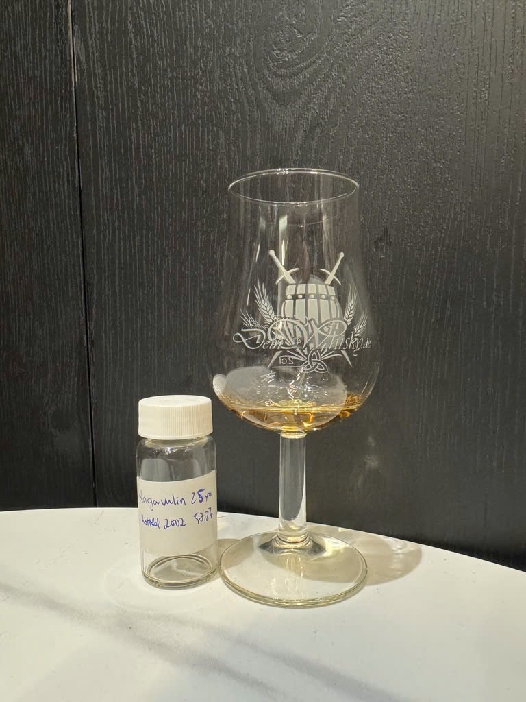 Client photo: Lagavulin 25 years tasting sample; tasting sample and glass.