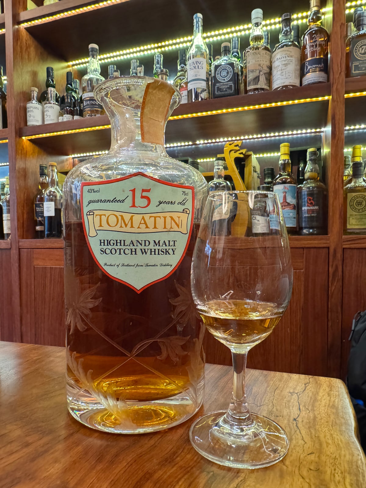 Illustrative image · Illustrative client photo: Tomatin 15y, 43%; importer unverified.