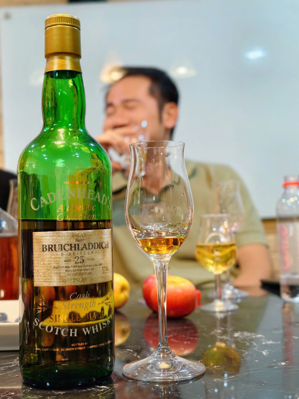 Client-supplied foreground bottle photo of Cadenhead Authentic Collection Bruichladdich1968/1993 25-year-old53.8%.