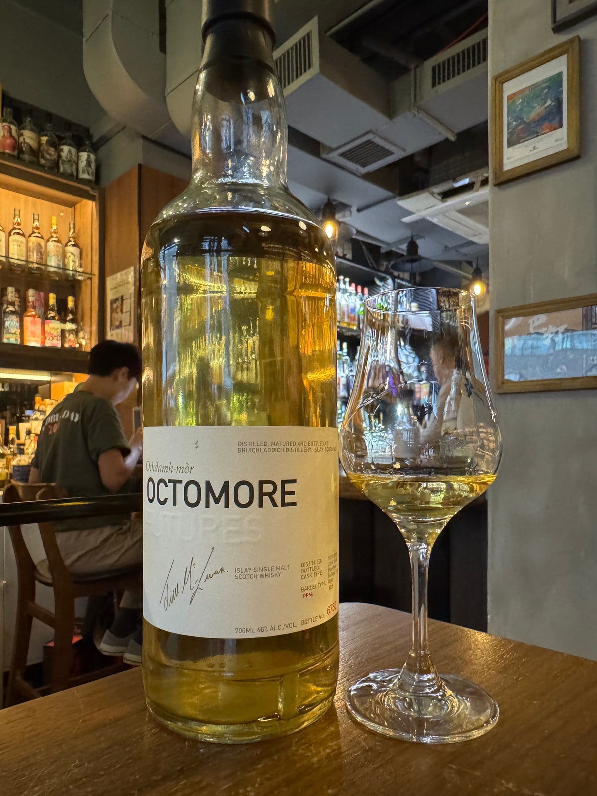 Illustrative image · Illustrative client photo: Octomore, 46%; distillation/bottling years and Futures designation unverified.