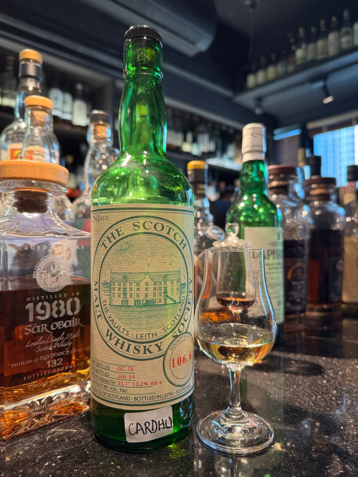 SMWS106.6 Cardhu1978/1994 53.2% — central foreground bottle label