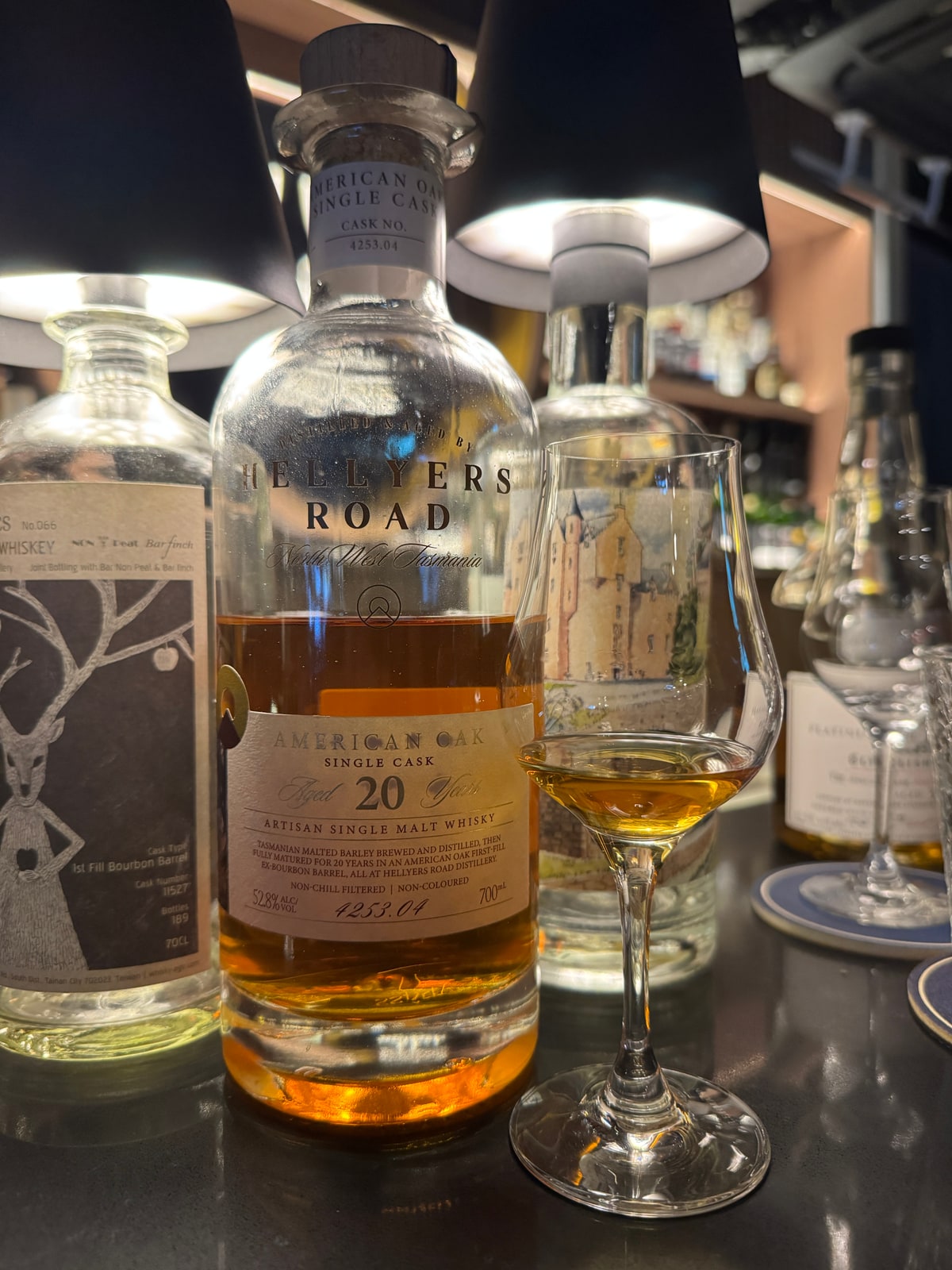 Illustrative image · Illustrative client photo: Hellyers Road 20y, 52.8%, cask 4253.04; vintage not printed.