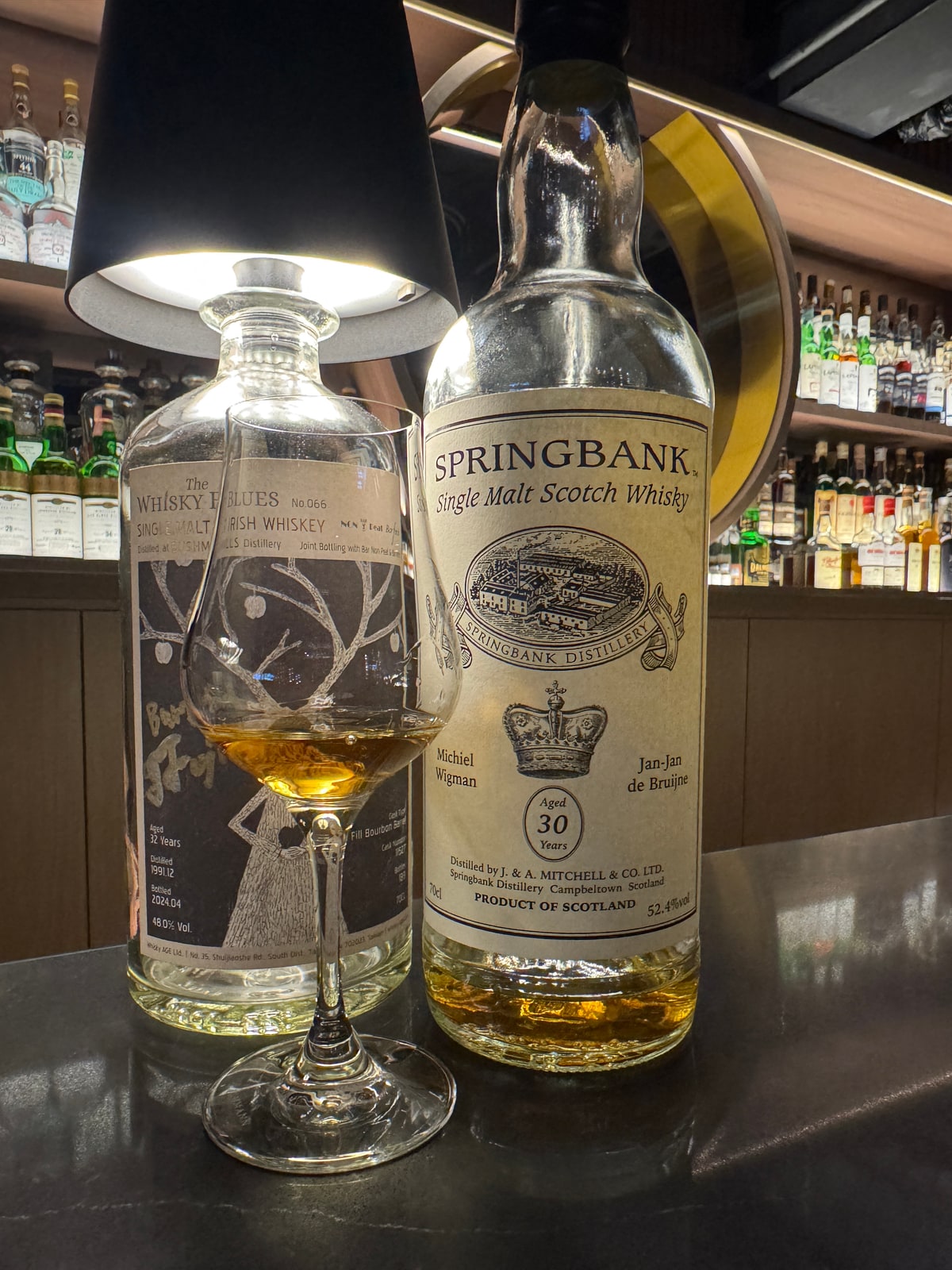 Client-supplied Springbank 1993/2023, 30 years, 52.4%, for Michiel Wigman & Jan-Jan de Bruijne in the right foreground; dates corroborated by the exact critic entry. Left bottle excluded.