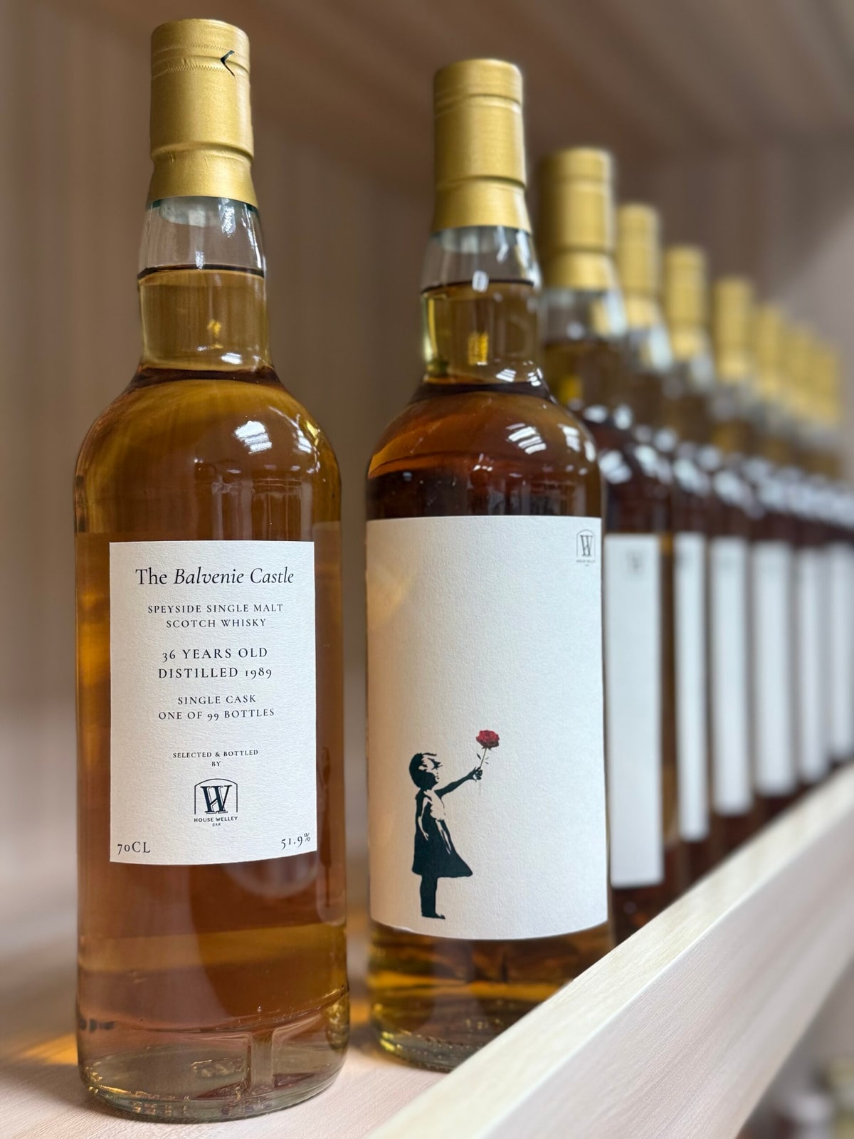 Internet reference photo: The Balvenie Castle, House Welley, 1989, 36 years, 51.9%; The Good Spirits. Whole foreground bottles and background retained.
