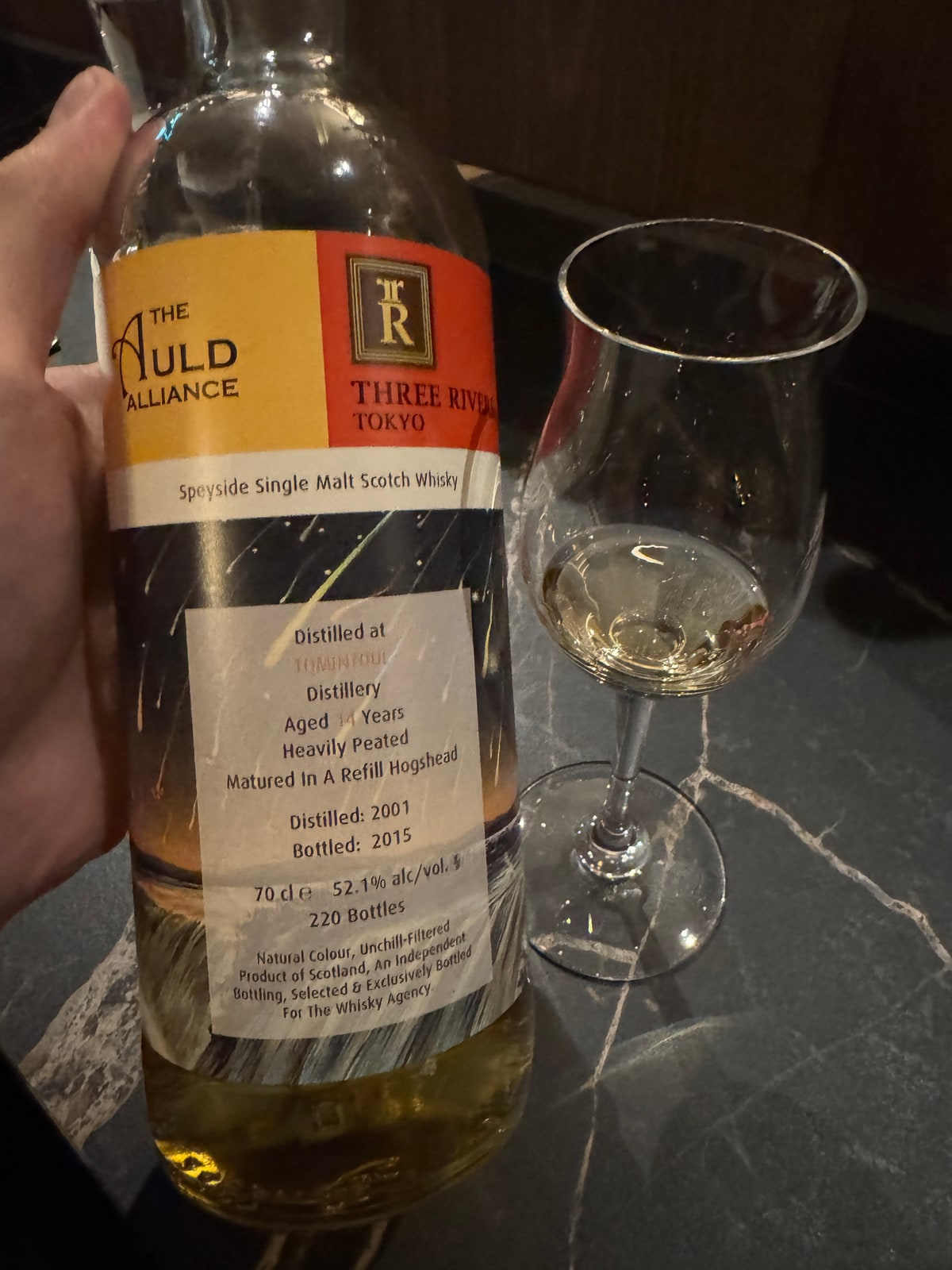 Illustrative image · Illustrative client label photo: Auld Alliance/Three Rivers heavily peated Speyside 2001/2015, 52.1%; distillery line faded.