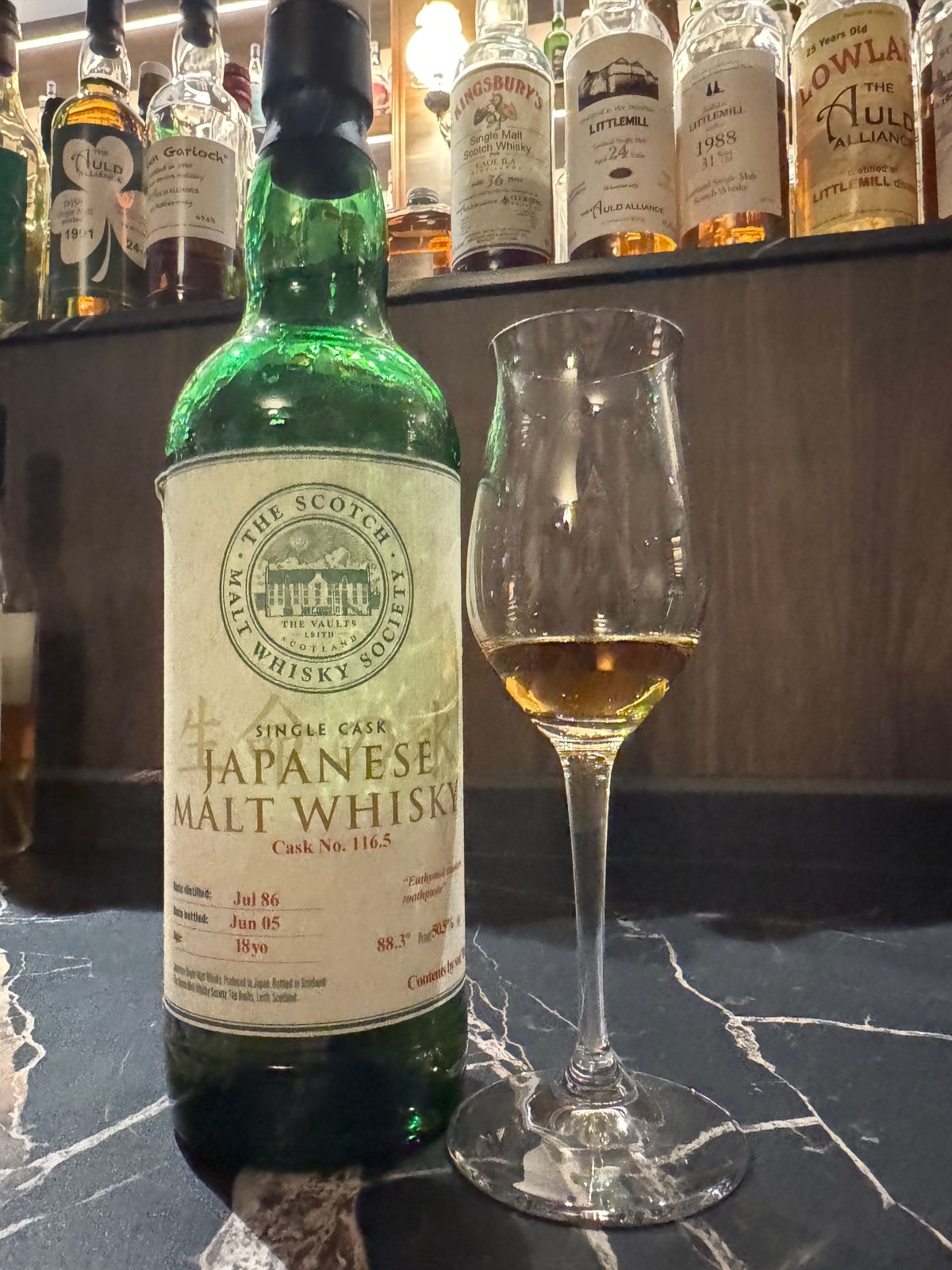 Client photo: SMWS 116.5, Jul 1986/Jun 2005, 18 years, with glass; bottle top cut off. 50.5% confirmed by Bar K catalogue.