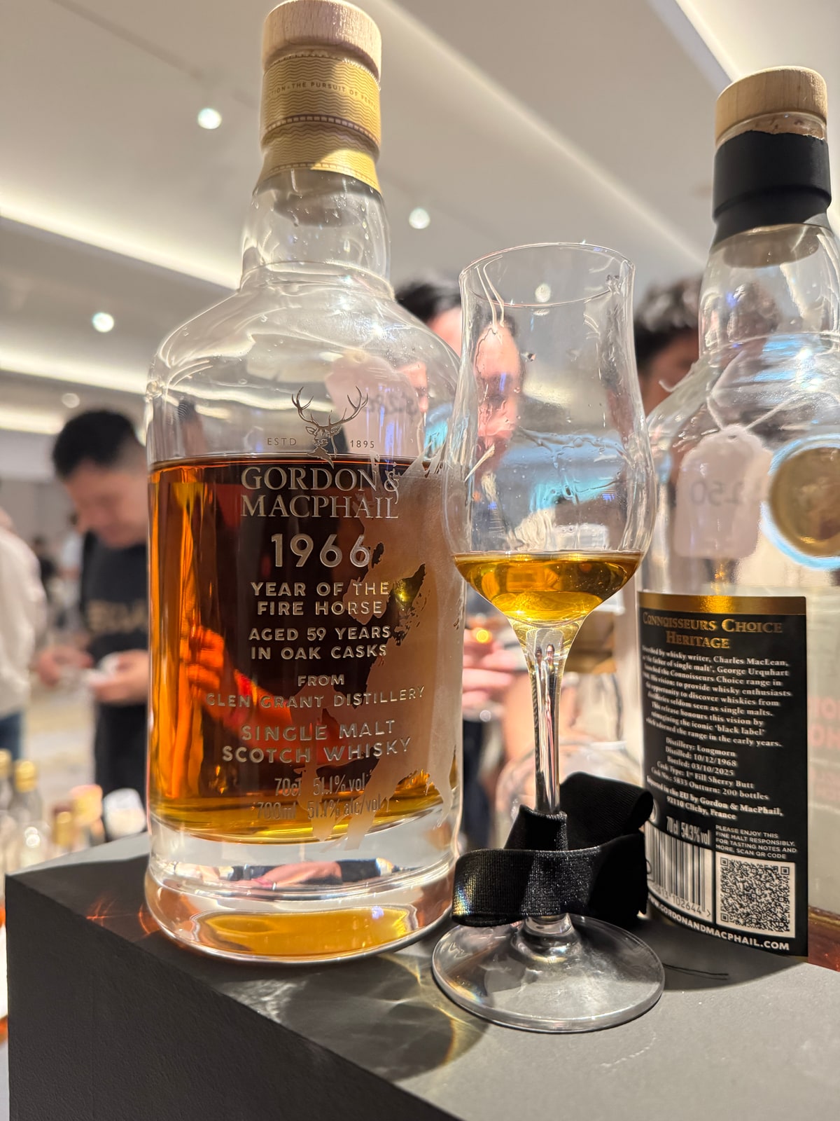 Client-supplied bottle photo of Gordon & MacPhail Glen Grant 1966 Year of the Fire Horse, 59 years, 51.1%; foreground bottle on the left.