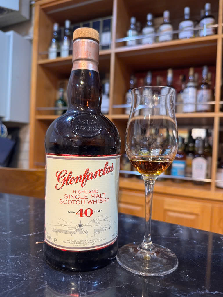 Client photo: Glenfarclas 40-year-old bottle with glass.