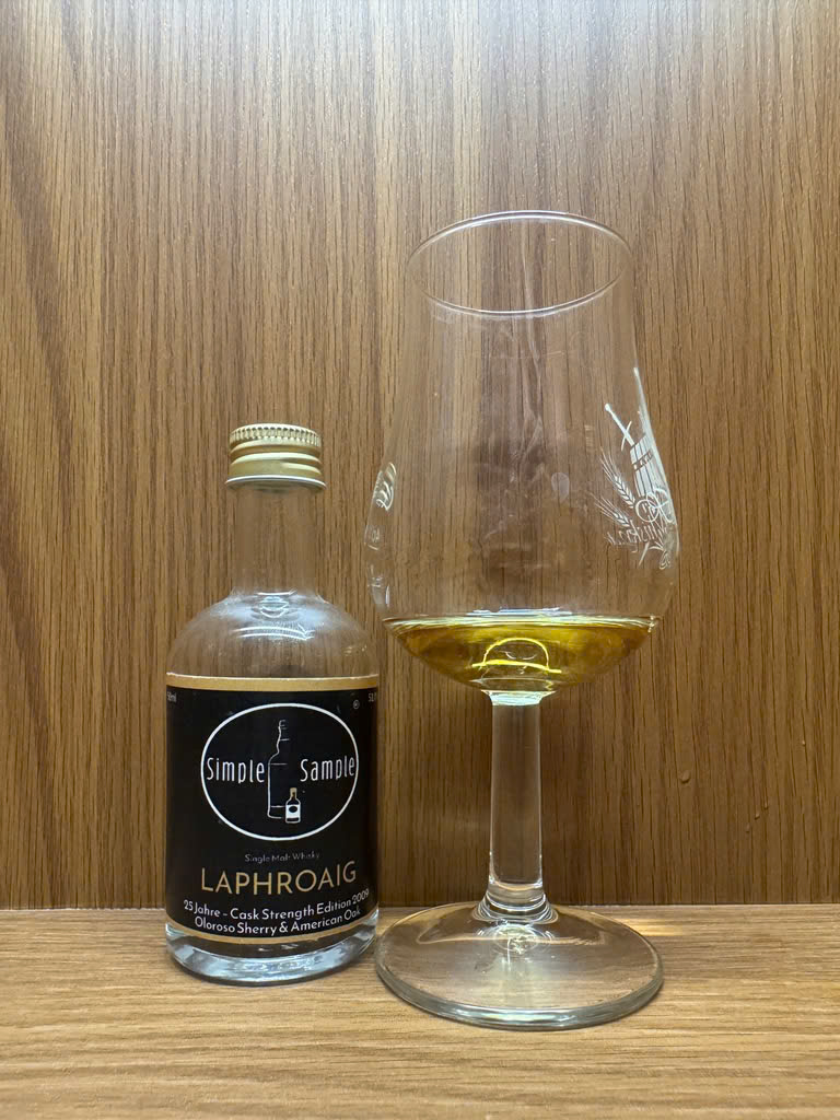 Client tasting sample: Simple Sample Laphroaig 25 Cask Strength Edition 2009, with glass; 51% is not visible on the front label.