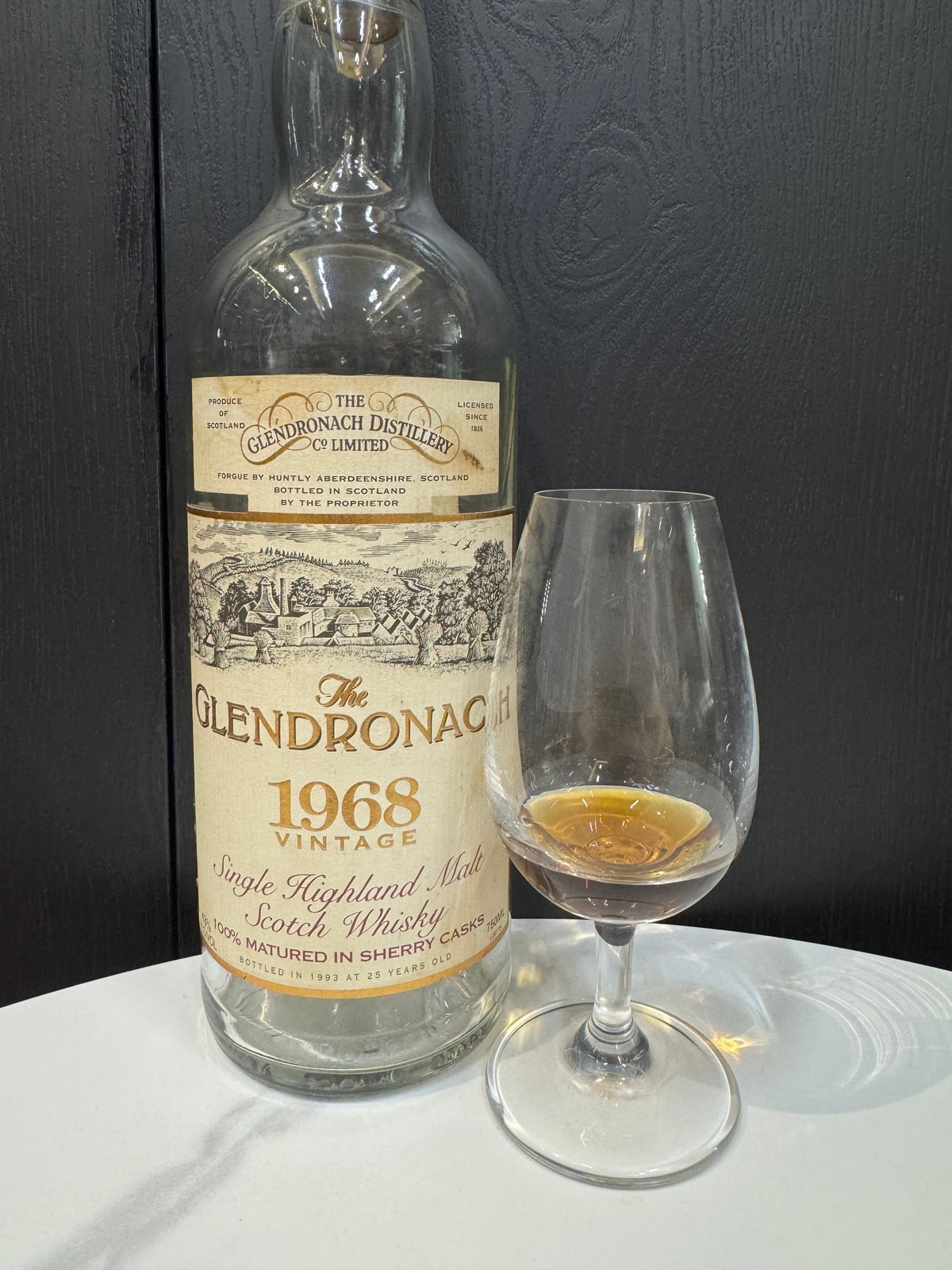 Illustrative image · Illustrative client photo: GlenDronach 1968/1993, 25 years, with glass; cask 13 is unverified. Bottle top is cut off in the original.