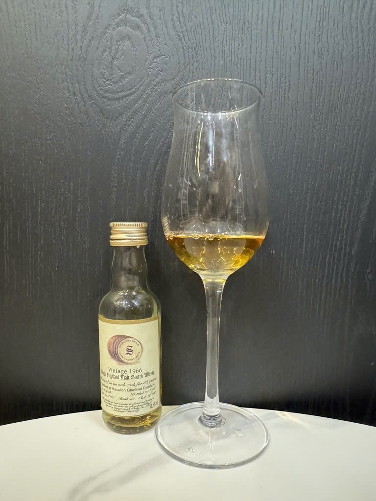 Client photo: Signatory Vintage Macallan tasting sample; tasting sample and glass.