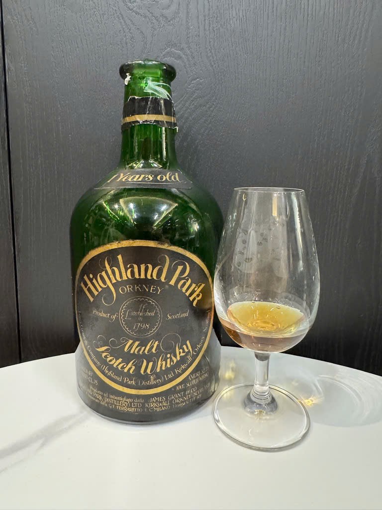 Client photo: Highland Park 21 years green dumpy bottle; bottle view.