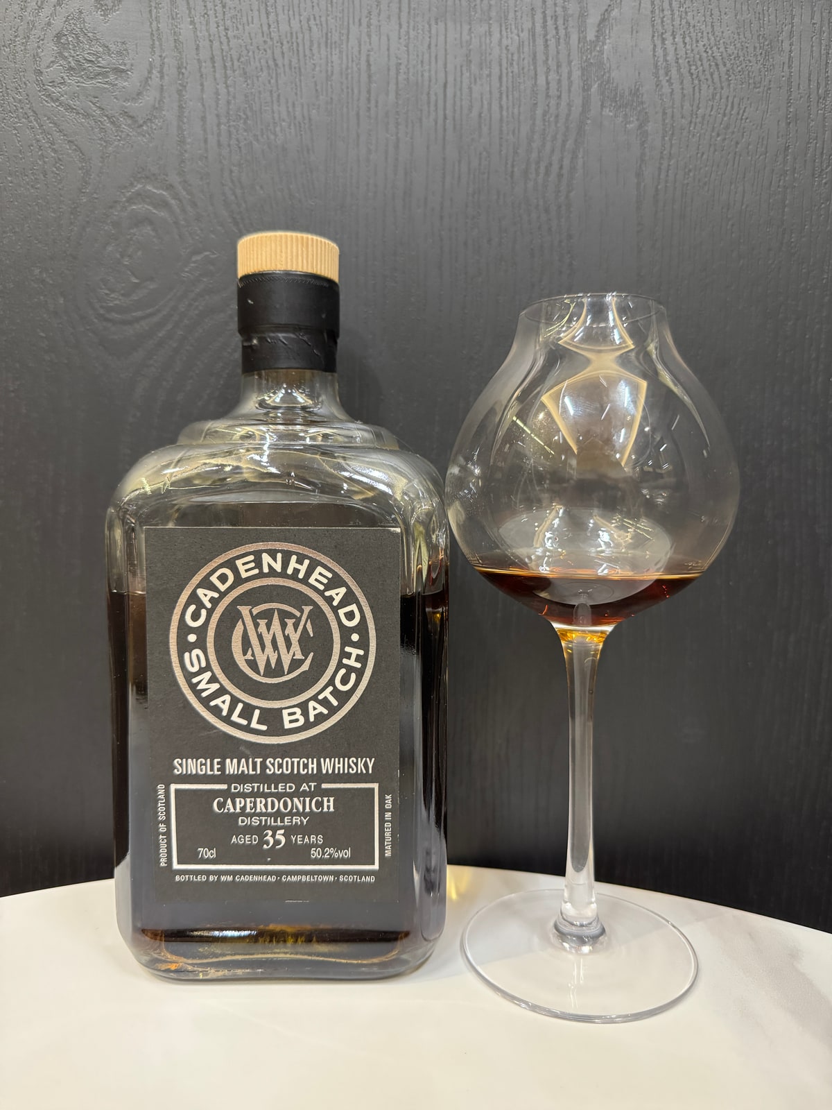 Illustrative image · Illustrative client photo: Cadenhead Small Batch Caperdonich 35y, 50.2%; distillation and bottling years unverified.